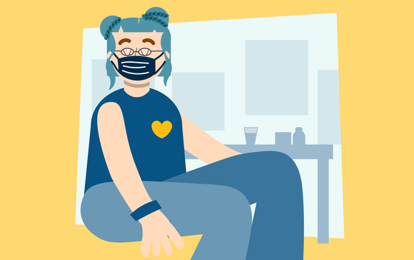A young person wears a COVID mask