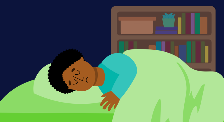 A young girl hugs a cat with a cup of tea.